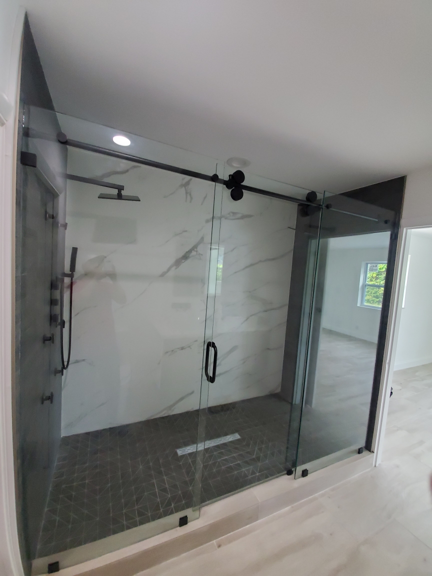 Frameless sliding bypass shower door Miami Broward large opening