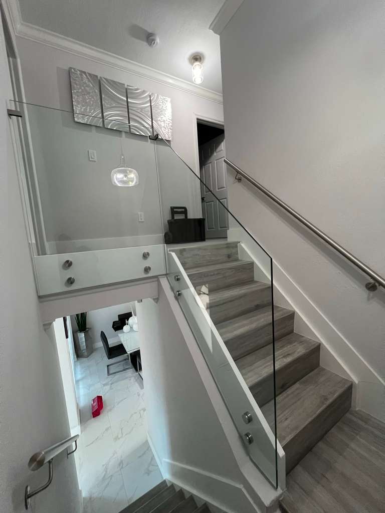 Frameless glass railings Miami staircases balconies
